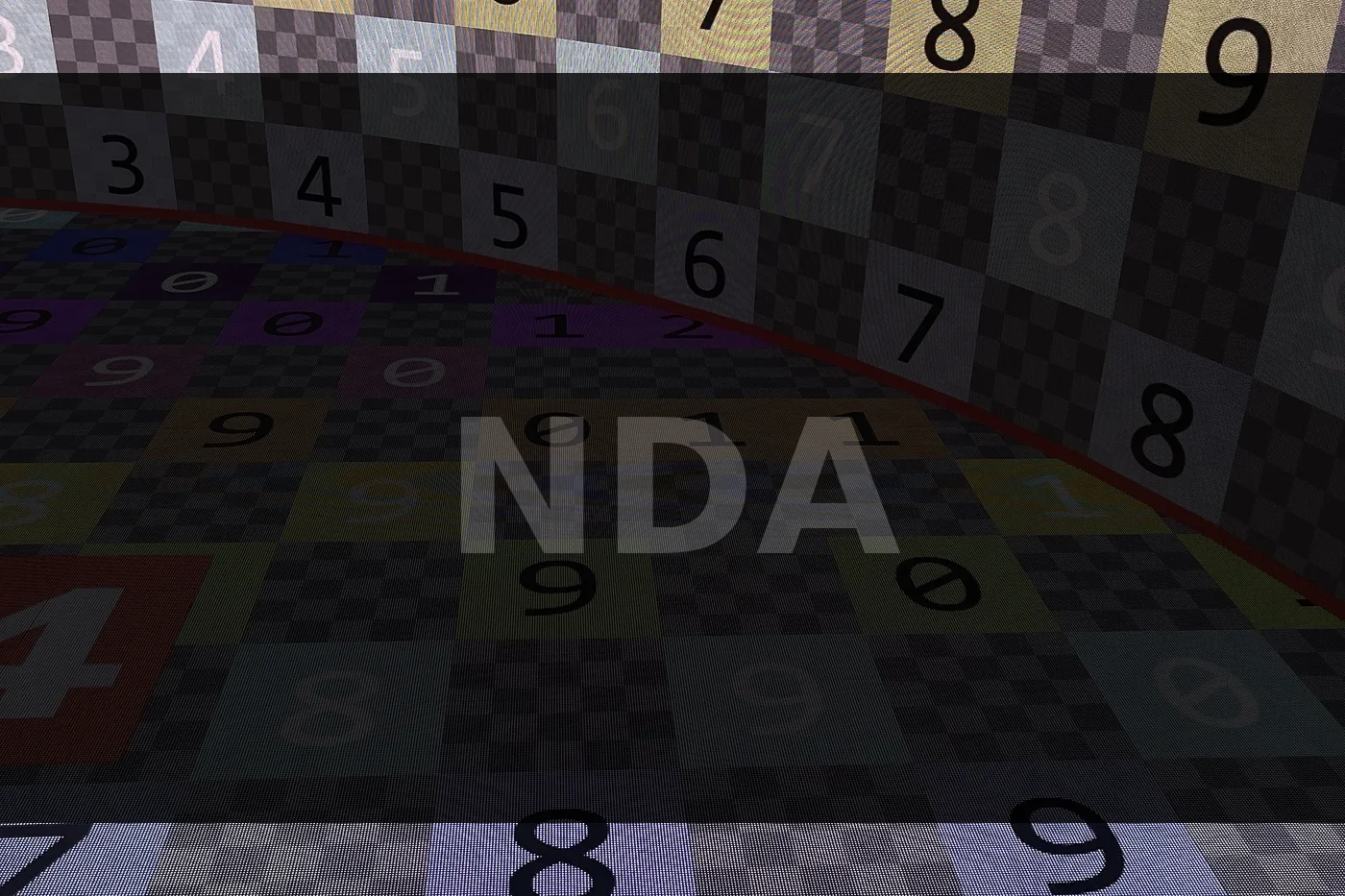 Operator at multi-monitor production desk