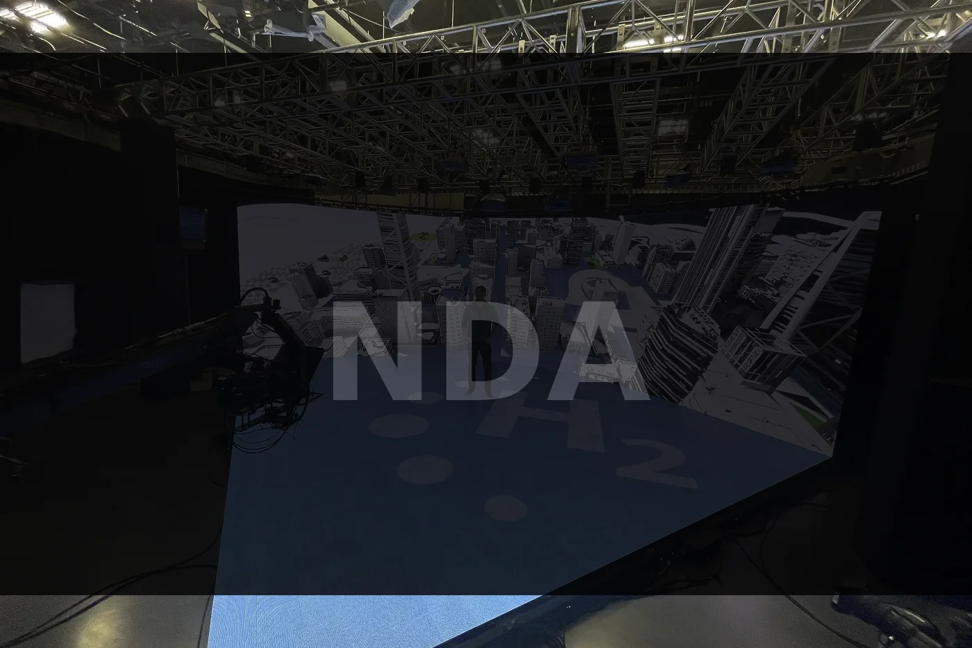 Technical director in control room with video feeds