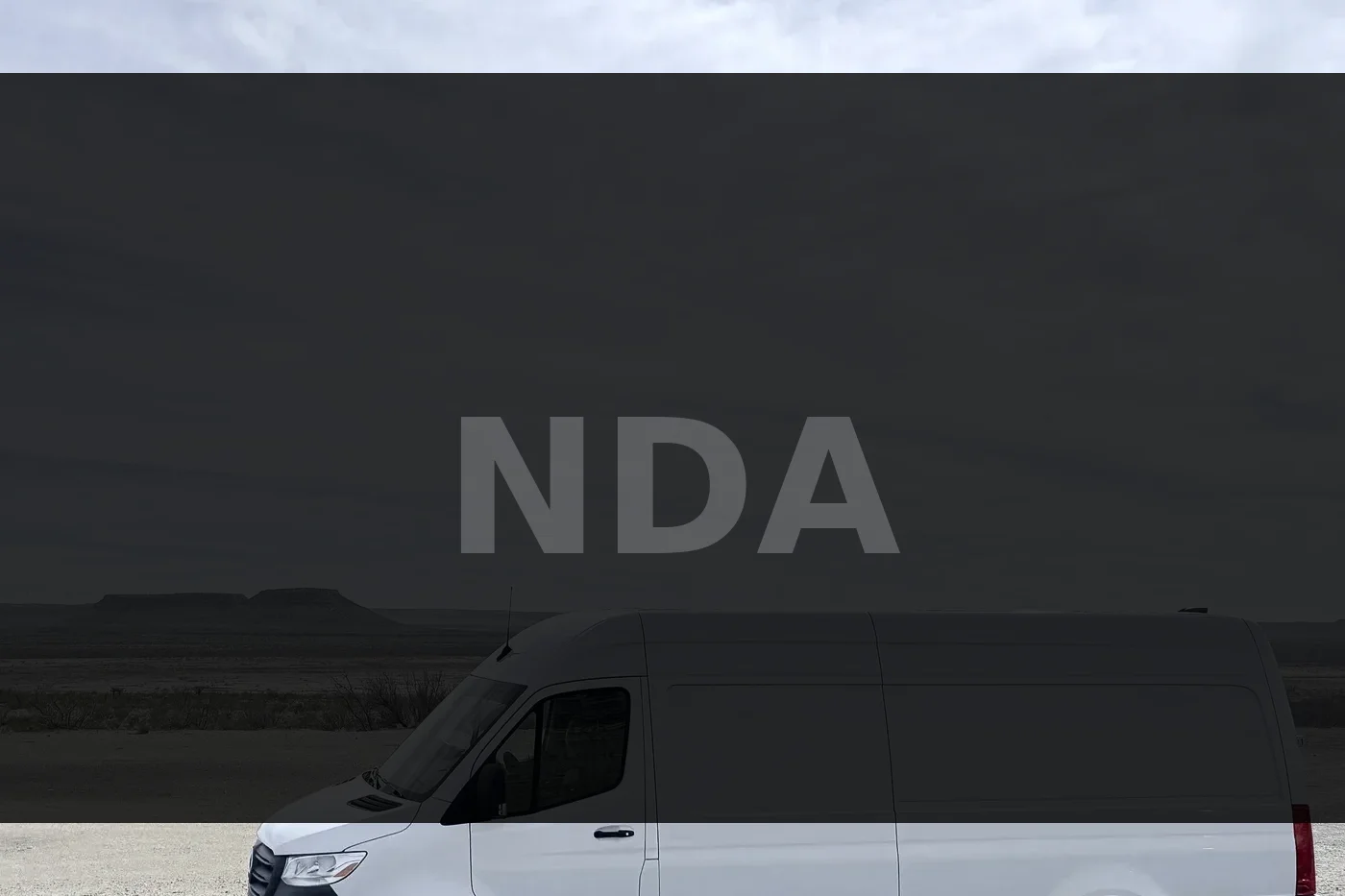 Equipment van in open landscape